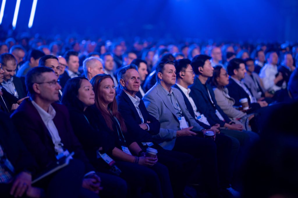 Audience seated and watching presentation at hp conference